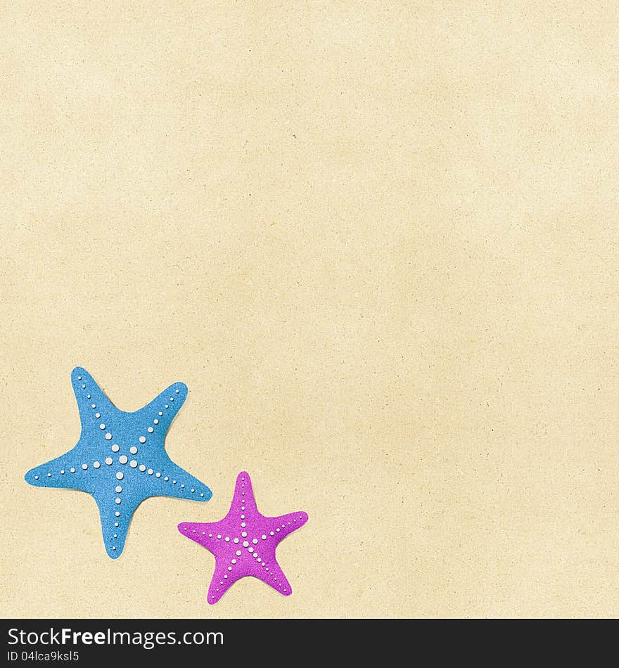 Starfish on beach recycled papercraft background