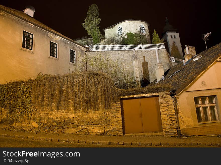 View of the older town houses at night. View of the older town houses at night