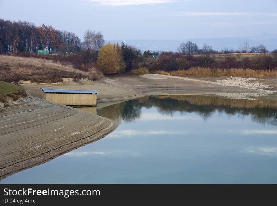 Barren shores after discharge of water from the dam. Barren shores after discharge of water from the dam