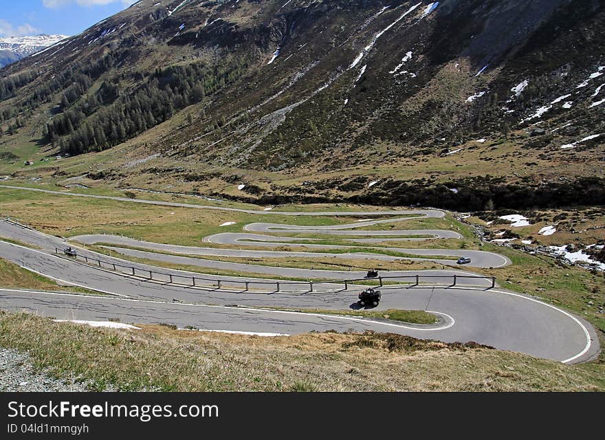 Many turns on the mountain road on spluegen in the Swiss