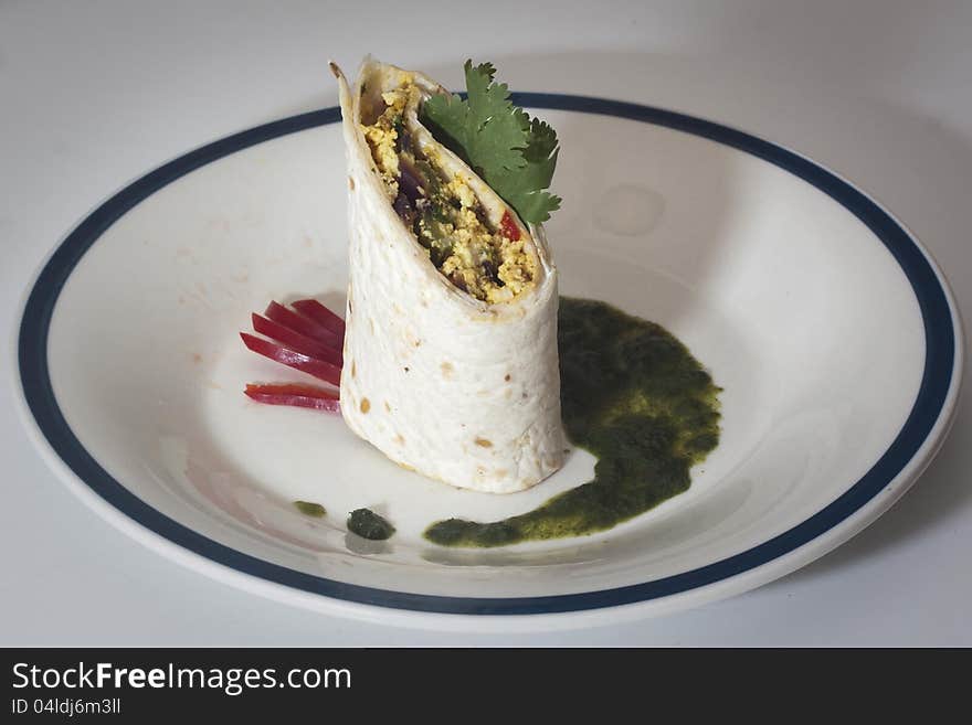 Cottage cheese wrap served with green chili and mint sauce