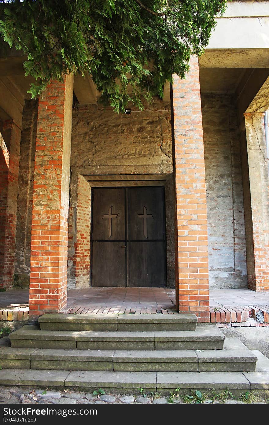 Mysterious medieval church door and brick pillars. Mysterious medieval church door and brick pillars.