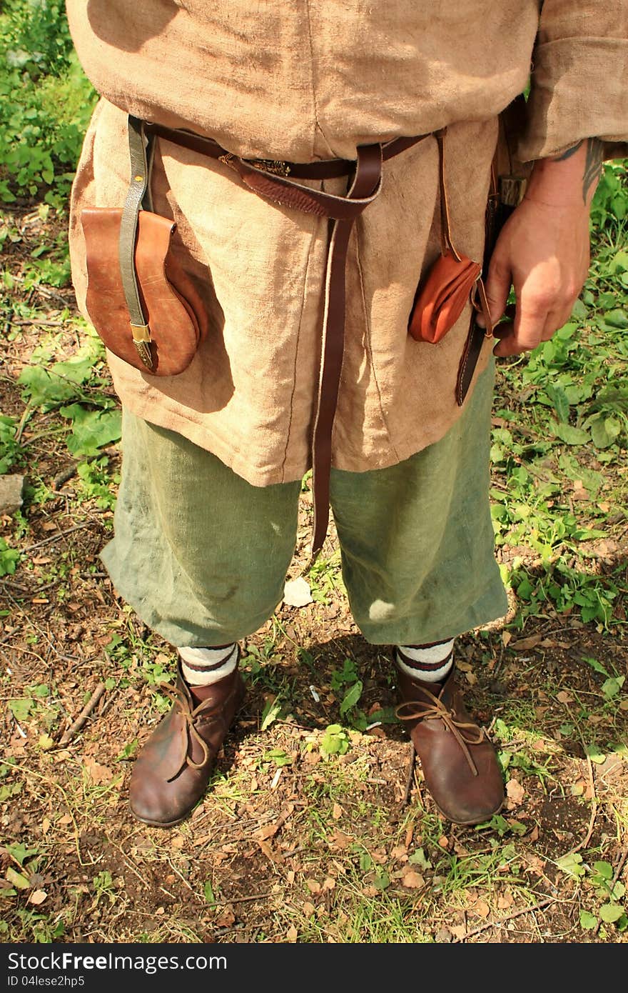 Wear of the Slavic medieval warrior's: shirt, pants, belt, shoes, purse. Wear of the Slavic medieval warrior's: shirt, pants, belt, shoes, purse