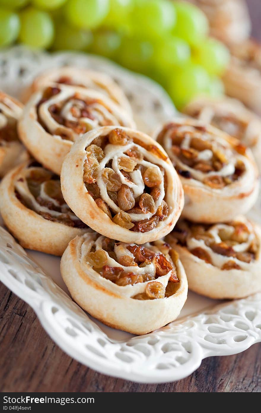 Pastry roll with raisins, selective focus