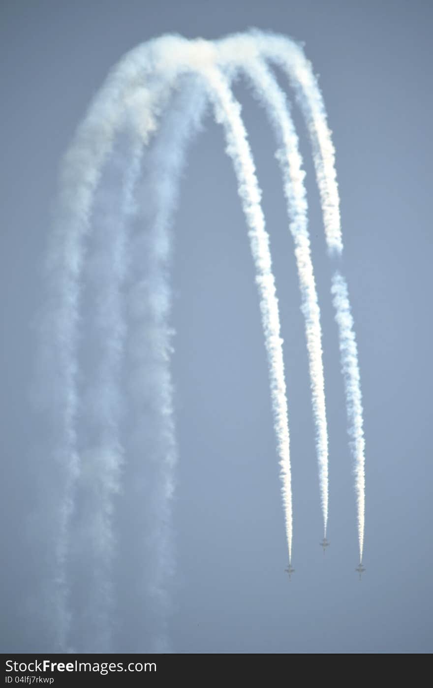 Aircrafts demonstrating acrobatics on an Air Show