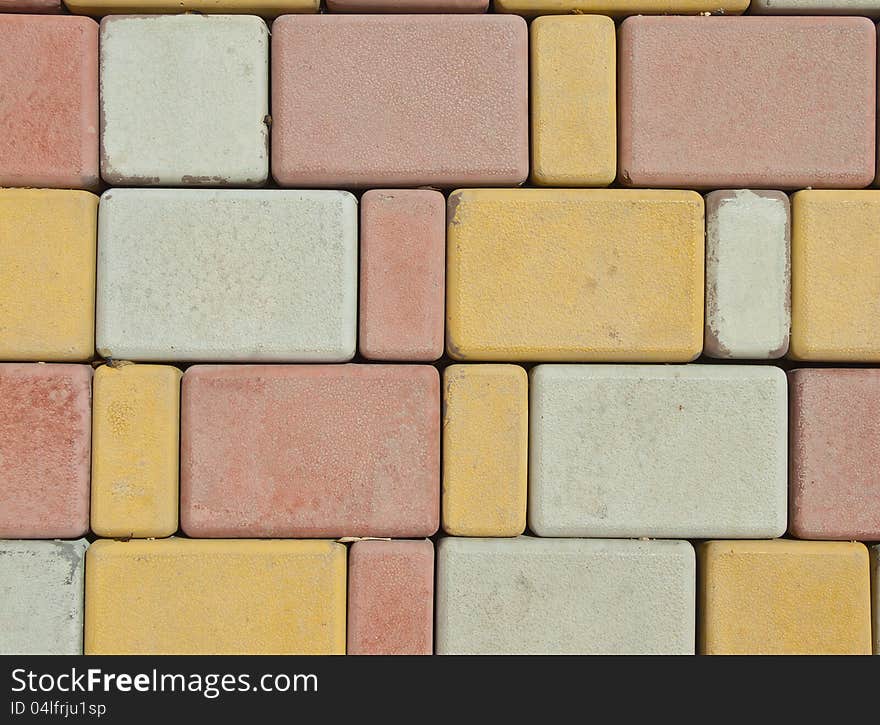 Multi-colored background and texture from old paving slabs. Multi-colored background and texture from old paving slabs