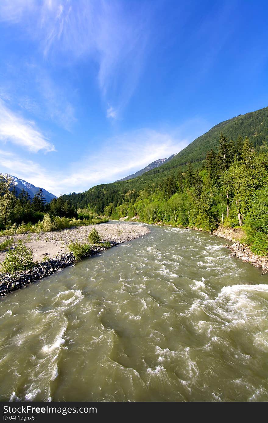 A fast moving river in the Coastal Mountain range of British Columbia Canada. A fast moving river in the Coastal Mountain range of British Columbia Canada