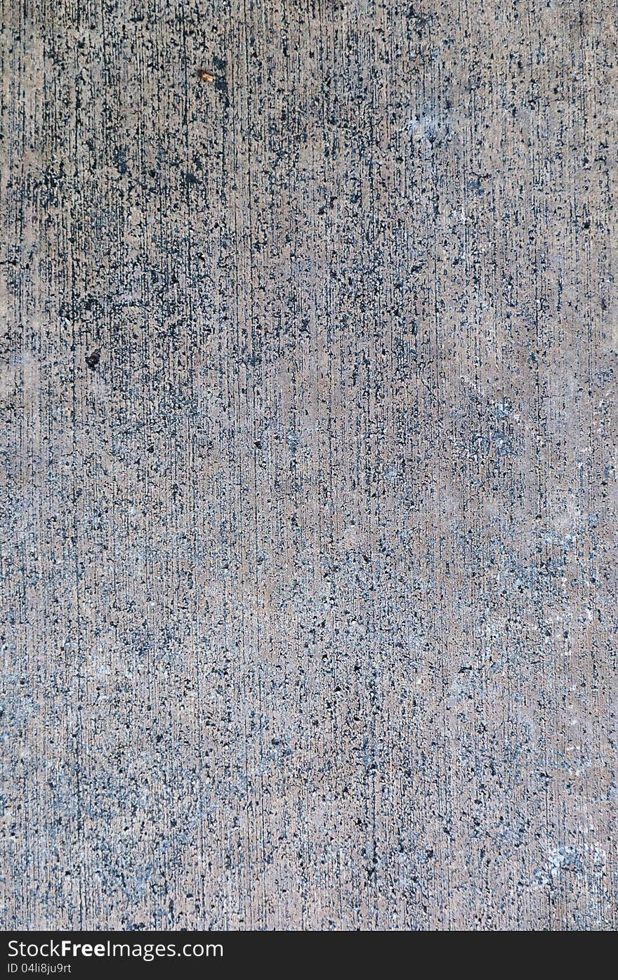 Cement background showing wear from weather and age. Cement background showing wear from weather and age.