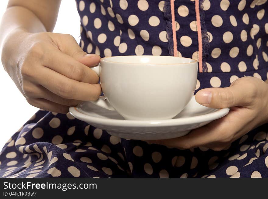 Woman wearing retro dress hold a cup of coffee. Woman wearing retro dress hold a cup of coffee