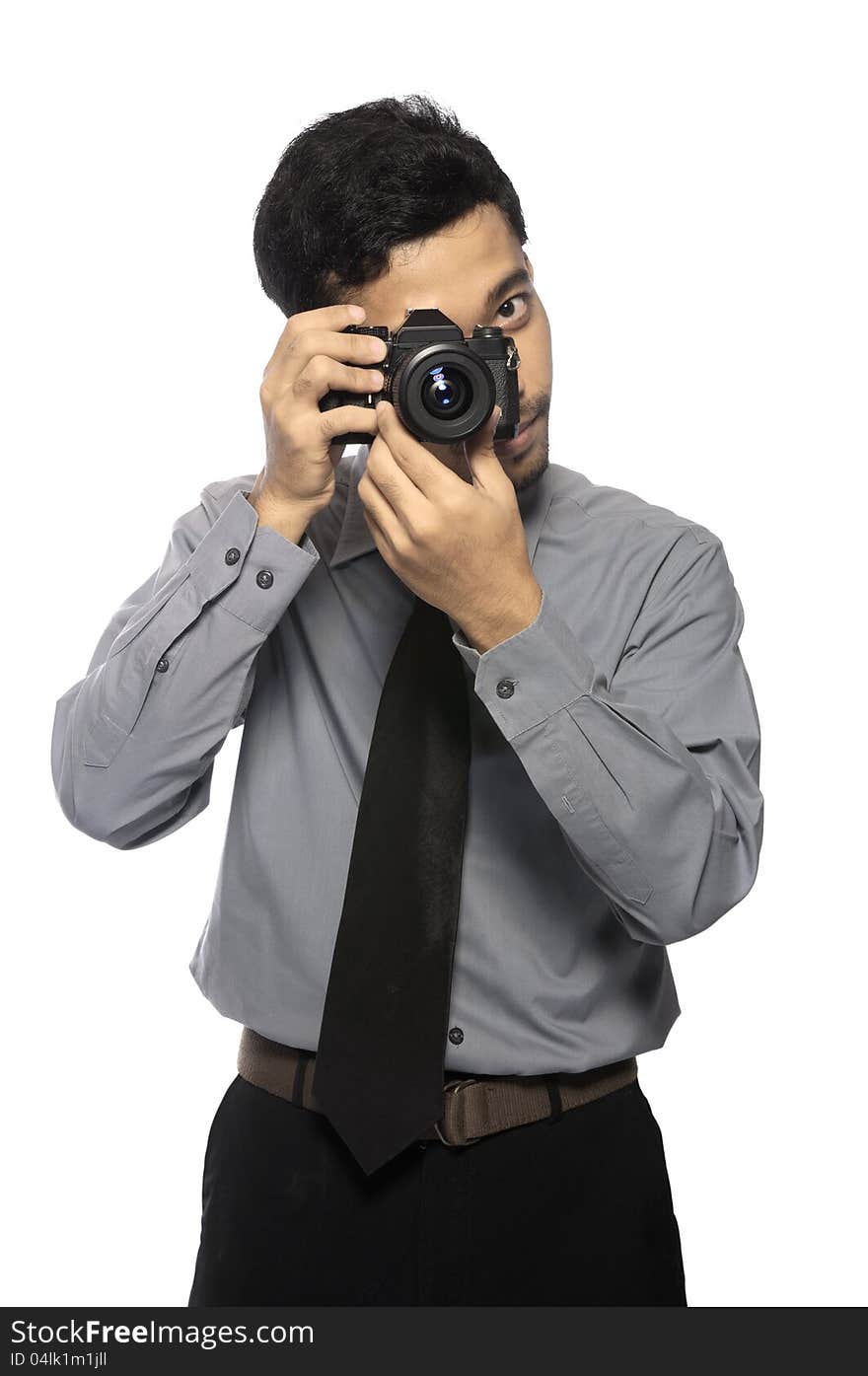 Photographer wearing shirt and tie take photo isolated over white background. Photographer wearing shirt and tie take photo isolated over white background