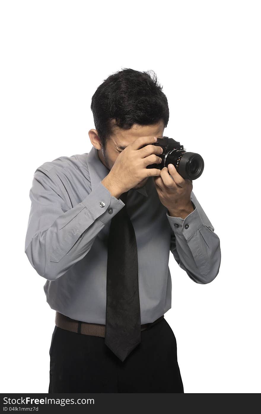 Photographer wearing shirt and tie take photo isolated over white background. Photographer wearing shirt and tie take photo isolated over white background