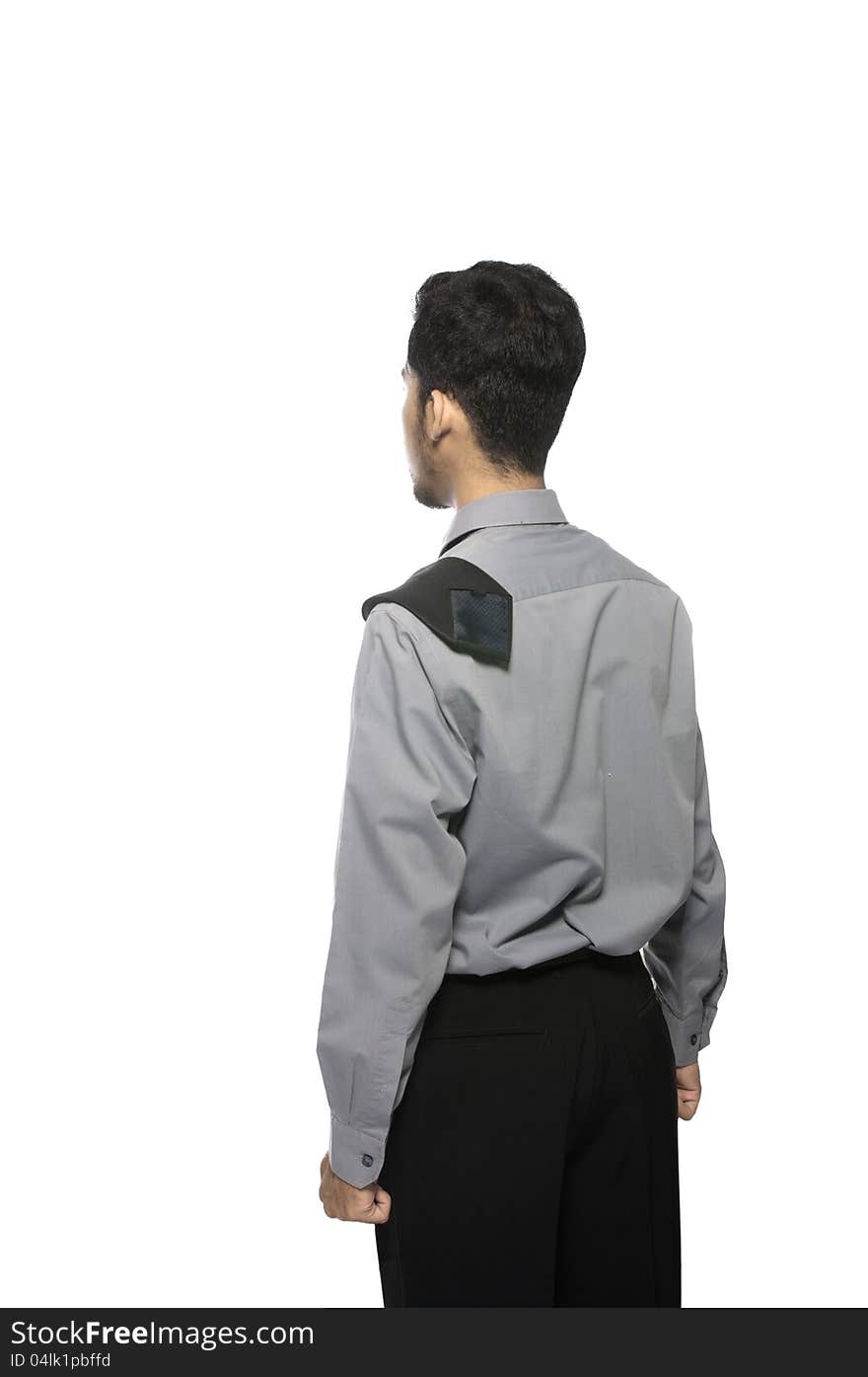 Asian business man shot from the back isolated over white background. Asian business man shot from the back isolated over white background