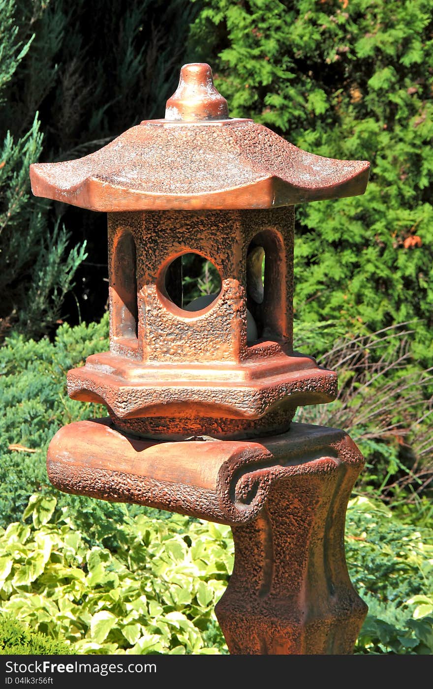 A decorative lantern agarden ornament. A decorative lantern agarden ornament.