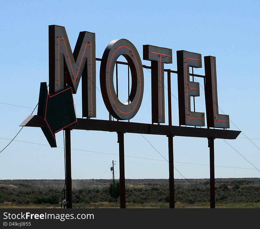 Lighted motel here sign with arrow. Lighted motel here sign with arrow