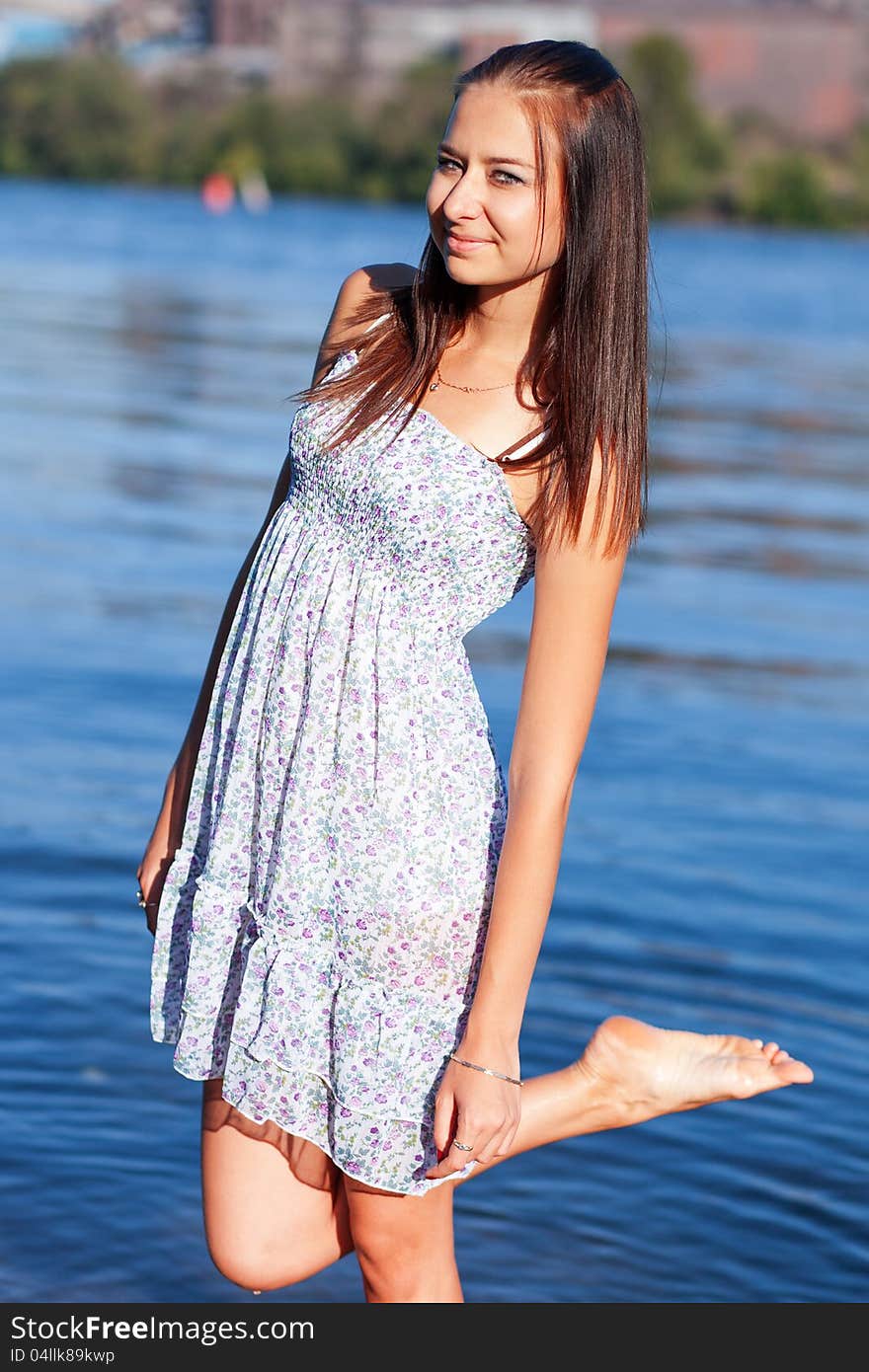 Portrait beautiful girl standing in the water