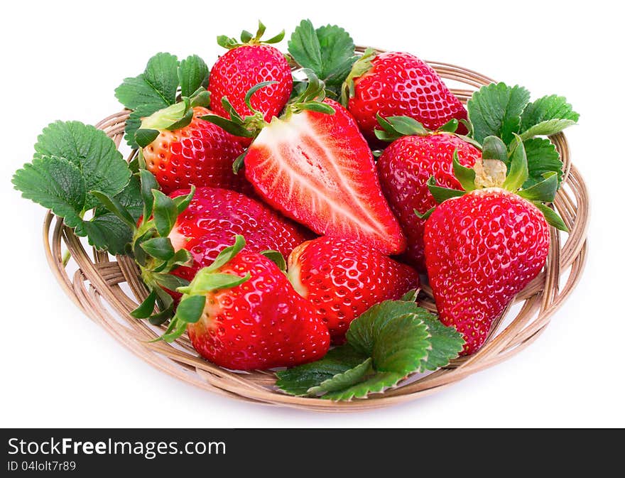 Fresh strawberries in the basket on the white background