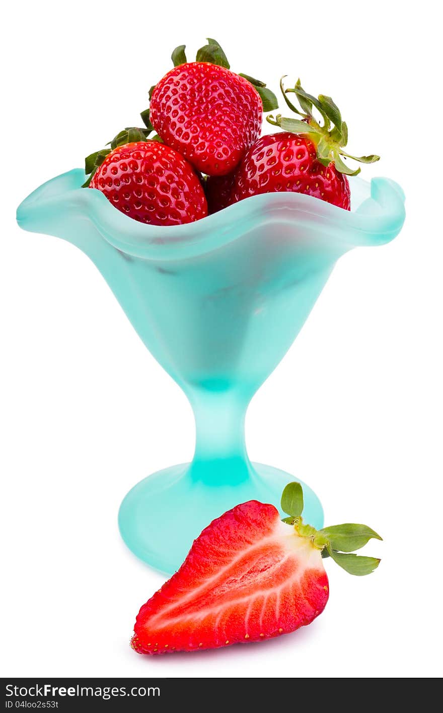 Fresh strawberries in the glass on the white background