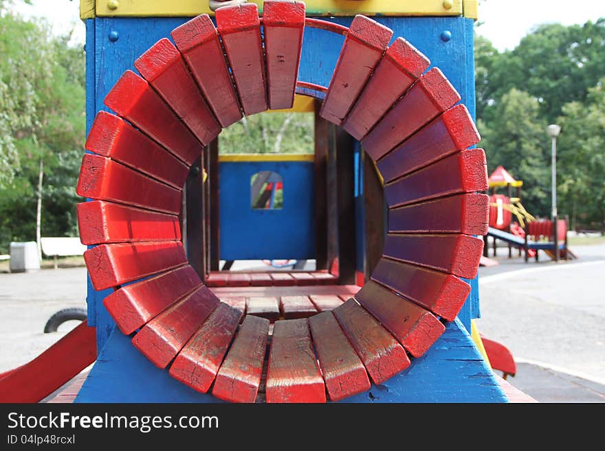 Colorful wooden coaster part of the playground, detail