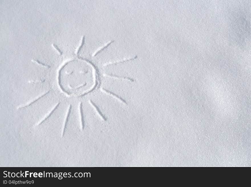 Picture of the smiling sun on the fresh white snow. Picture of the smiling sun on the fresh white snow