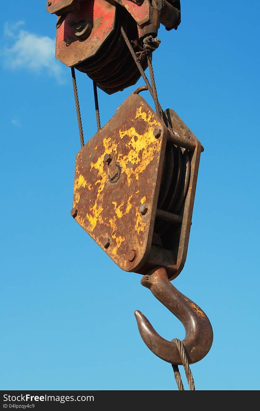 Hook a construction crane against a blue sky