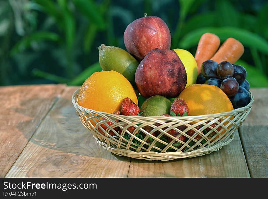 Various natural fruit and vegetables picture taken under warm morning light. Great image to illustrate healthy and natural food for diet or desert or background for fruit and vegetables product. Various natural fruit and vegetables picture taken under warm morning light. Great image to illustrate healthy and natural food for diet or desert or background for fruit and vegetables product.