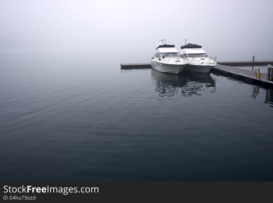 Boats in one foggy morning in Norway. Boats in one foggy morning in Norway