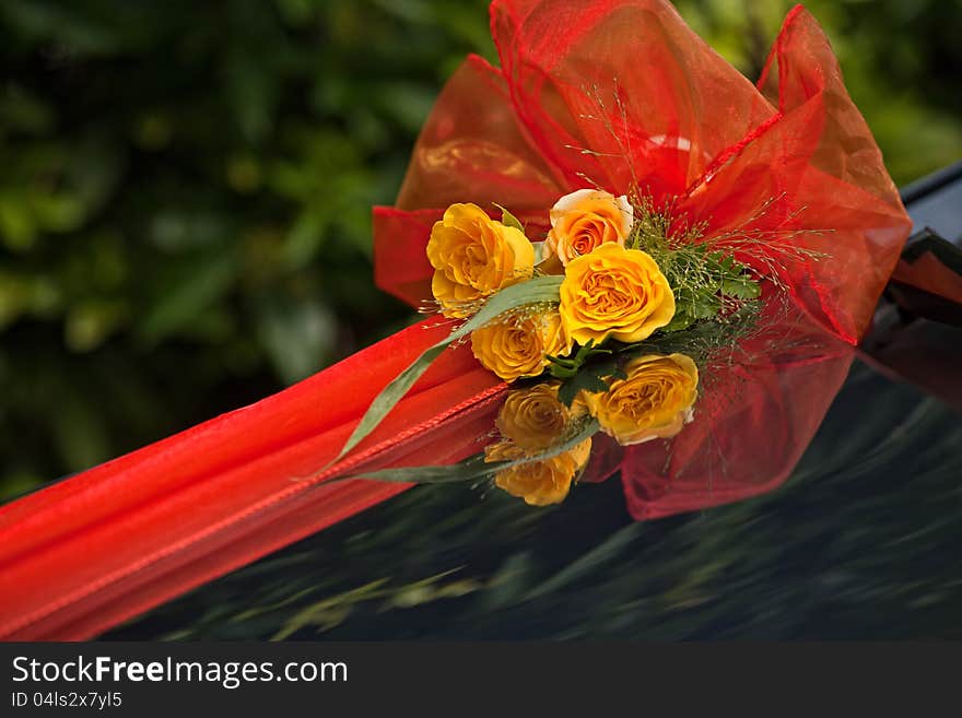 Bridal Bouquet on the Car with ribbon. Bridal Bouquet on the Car with ribbon