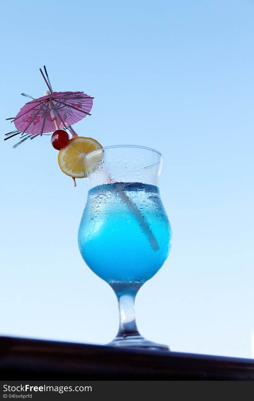 Exotic blue cocktail summer day. Exotic blue cocktail summer day