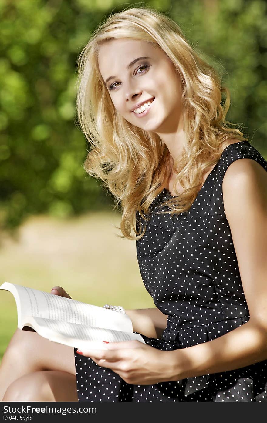 Young Woman Reading Book