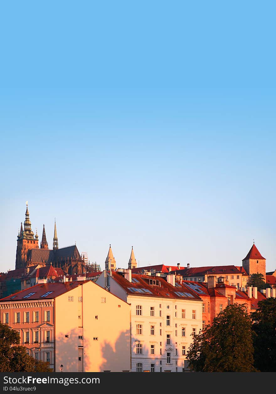 View of Prague city at dawn under blue sky with St. Vitus Cathedral in left side. Europe, Czech Republic. View of Prague city at dawn under blue sky with St. Vitus Cathedral in left side. Europe, Czech Republic