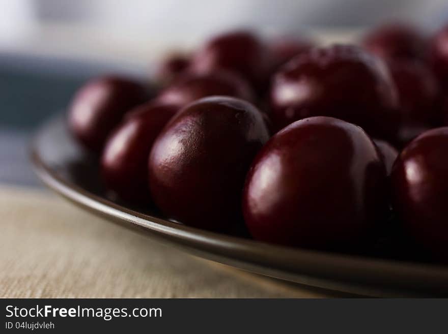 Heap of red fresh crerry on a plate. Heap of red fresh crerry on a plate