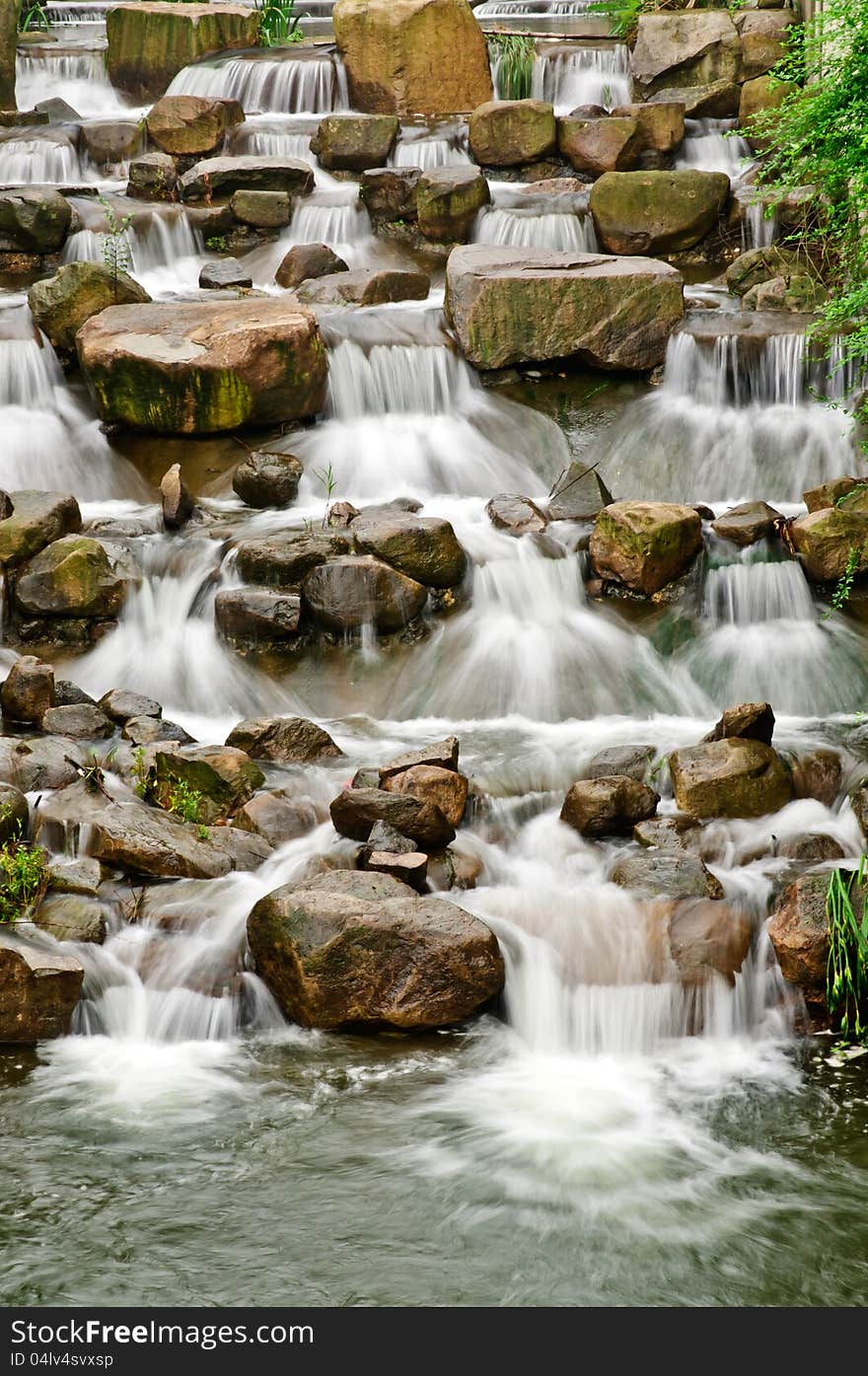 A mountain stream water in the stream never stops flowing. A mountain stream water in the stream never stops flowing.