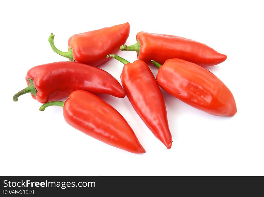 Isolated sweet red paprikas on white background