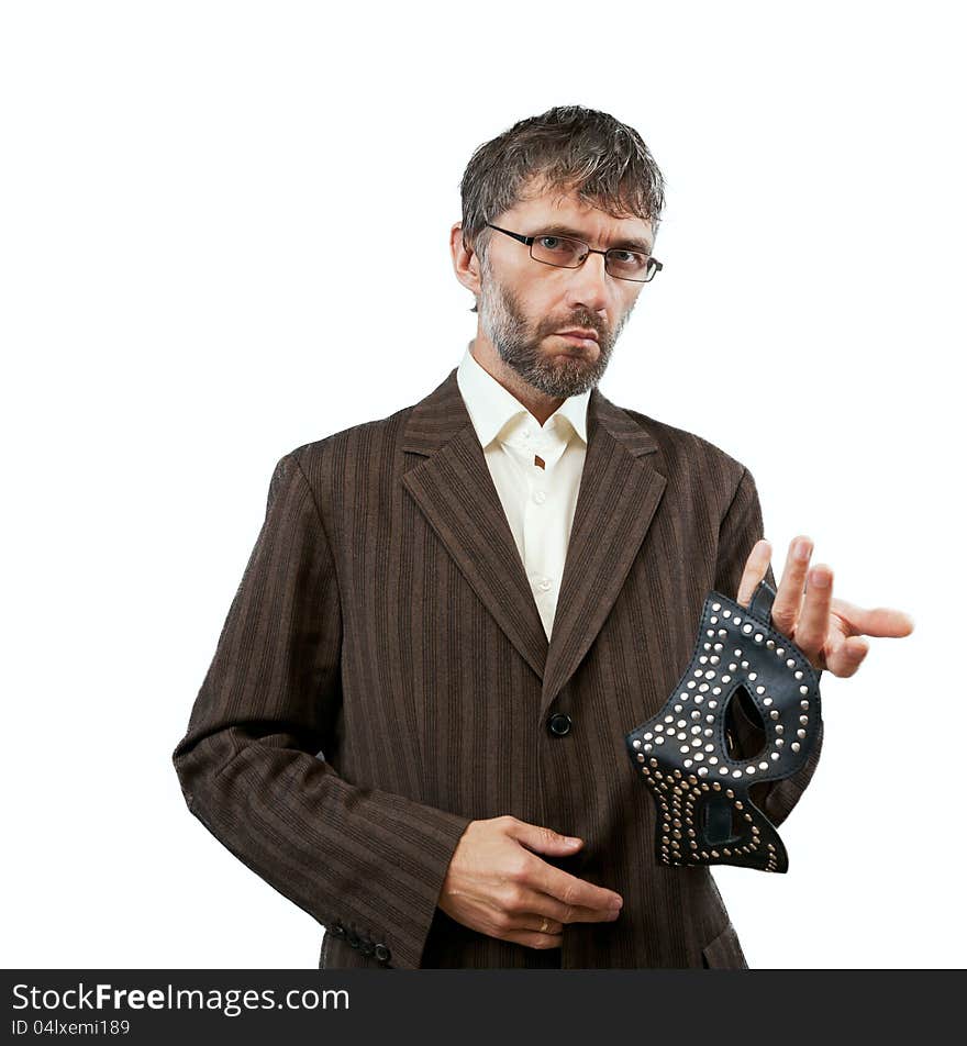 Man in a suit proposes BDSM mask