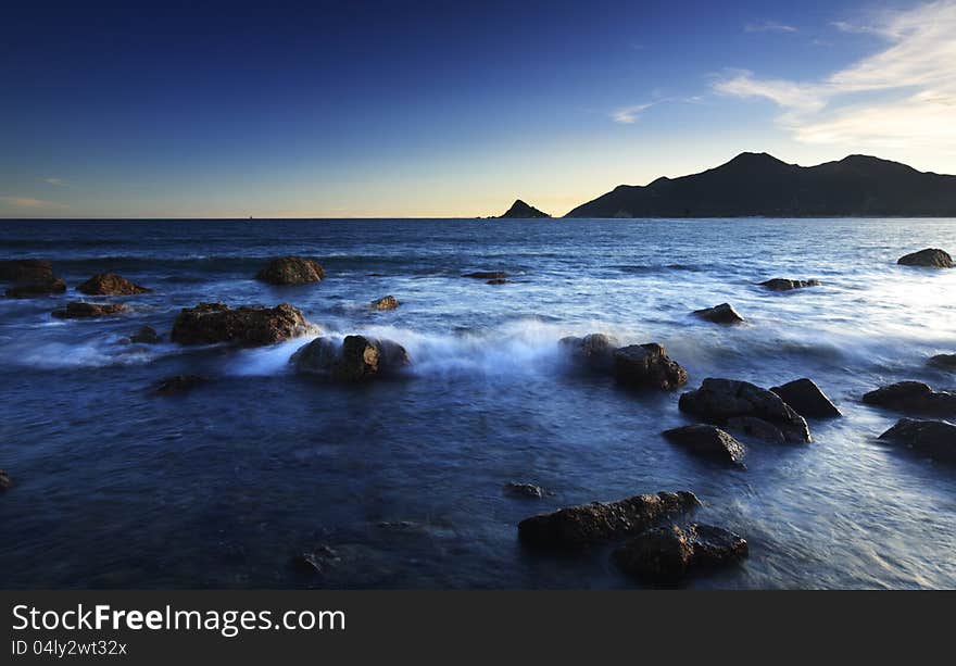 Wave and rock view at the coast,sunset moment,South China. Wave and rock view at the coast,sunset moment,South China