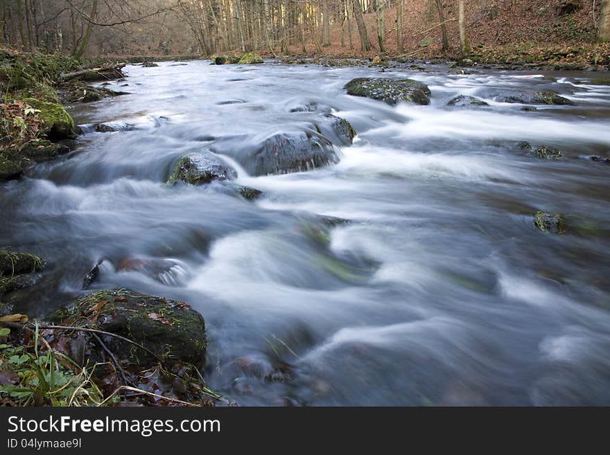 River flowing through the valley for a long time. River flowing through the valley for a long time