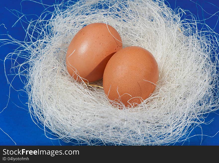 Easter eggs laid on white straw