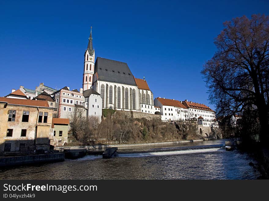 Church in czech krumlov and blue sky