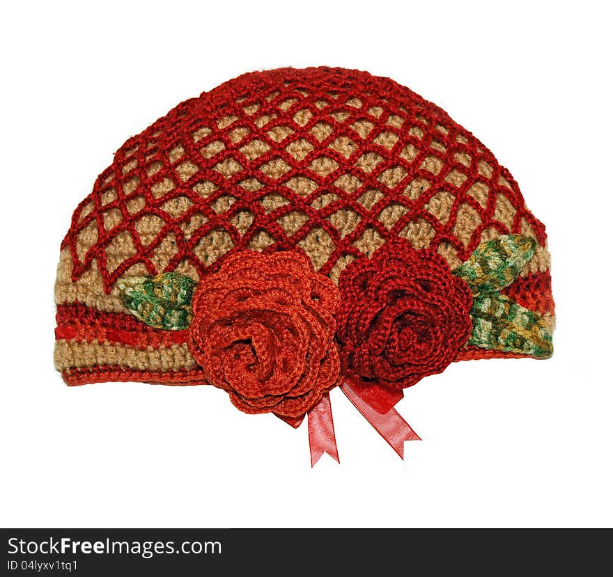 Women's knitted hat handmade with flowers rose. Women's knitted hat handmade with flowers rose