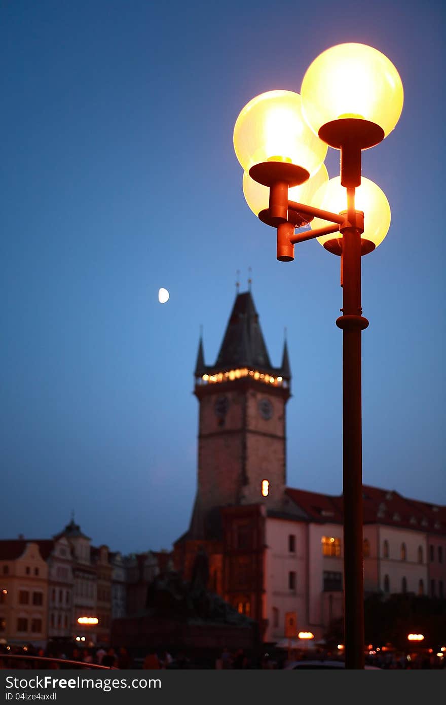 Luminous street lamp on background with Town Hall Tower,Prague,Czech Republic. Luminous street lamp on background with Town Hall Tower,Prague,Czech Republic