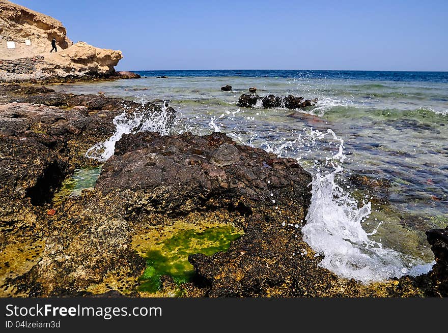 The wave of Red Sea is breaking on the shore