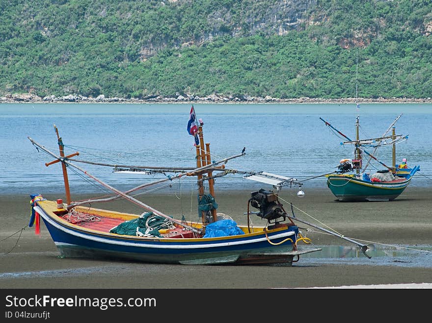 FISHING BOAT ON THE BEACH