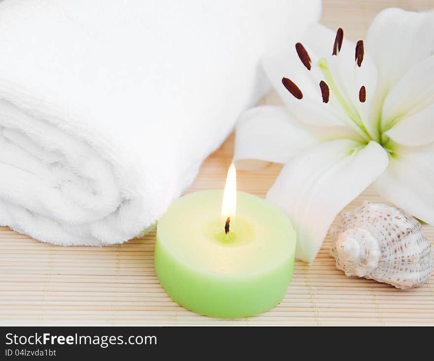 Spa feeling (flower, towel, candle and seashell). Spa feeling (flower, towel, candle and seashell)