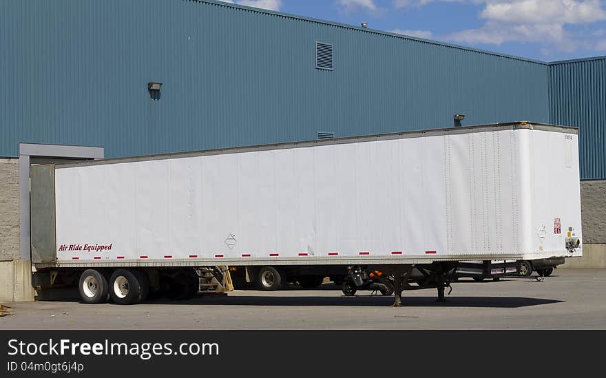 A trailer at a loading dock. A trailer at a loading dock