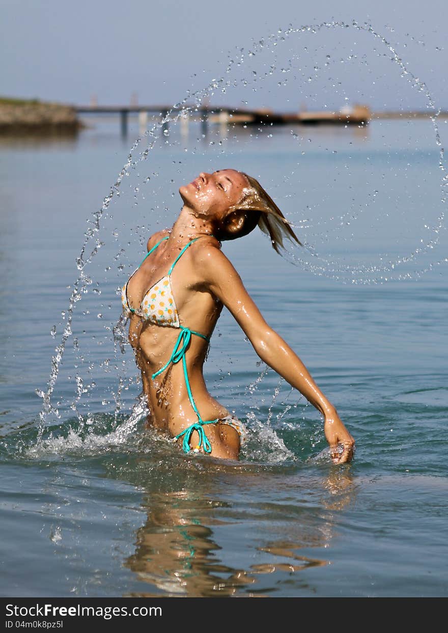 Woman playing in water