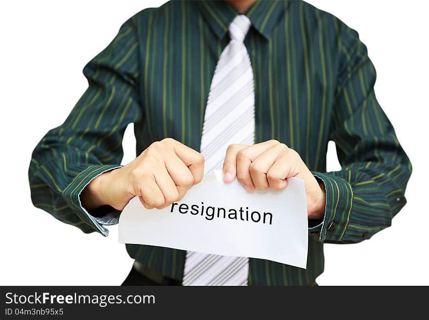 A business man tearing a resignation letter