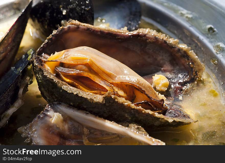 Delicious dish with steamed Adriatic mussels. Macro. Delicious dish with steamed Adriatic mussels. Macro