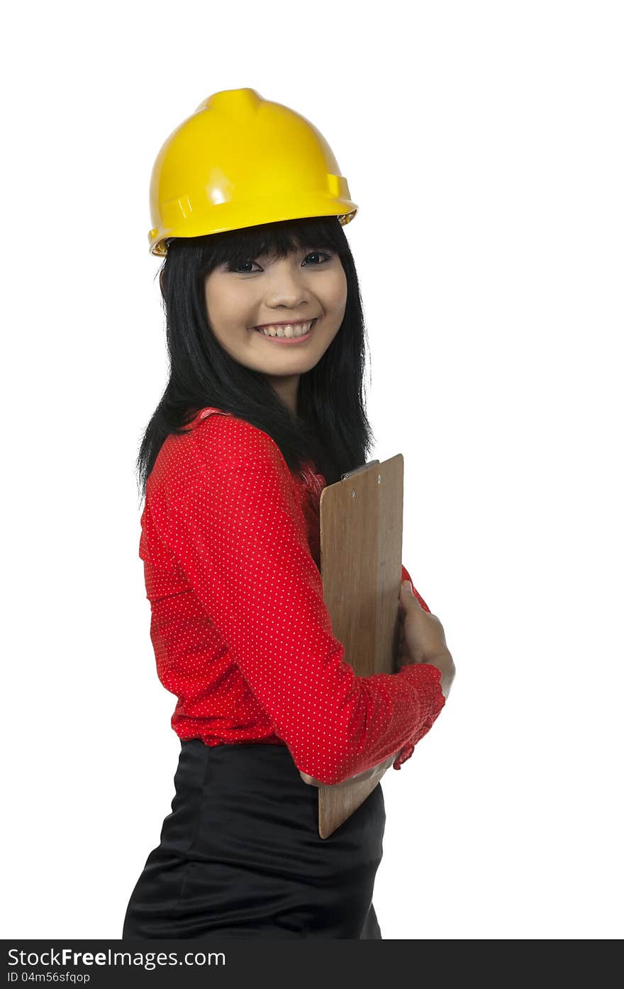 Architect woman holding clipboard isolated over white background. Architect woman holding clipboard isolated over white background