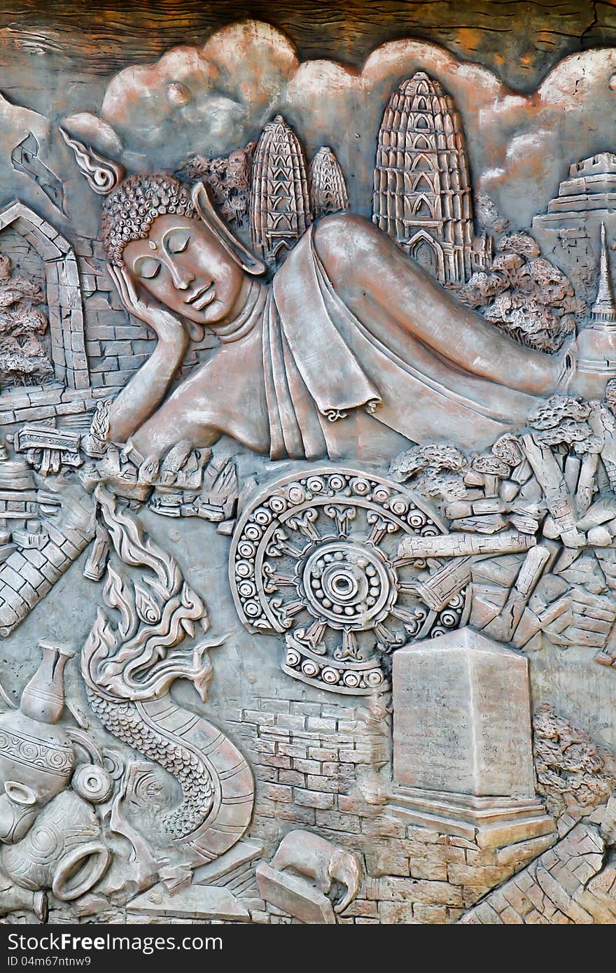 Stucco sculpture of religion on the wall in nongnuch garden thailand. Stucco sculpture of religion on the wall in nongnuch garden thailand