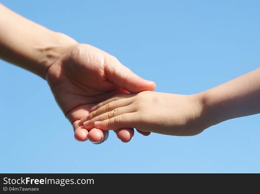 A mother giving a daugther a helping hand.